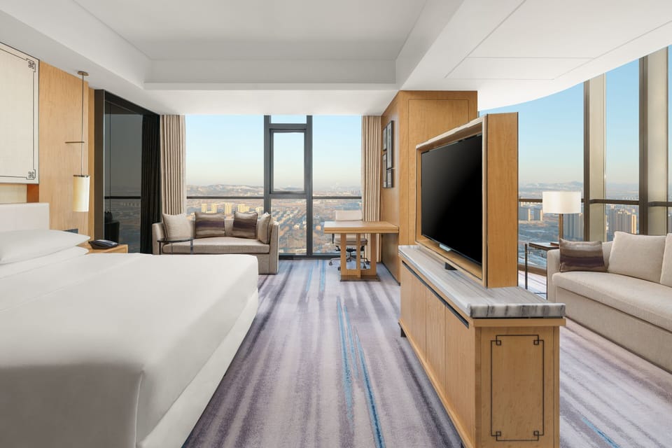 Premium bedding, down comforters, in-room safe, desk