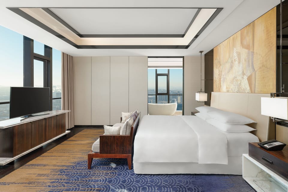 Premium bedding, down comforters, in-room safe, desk