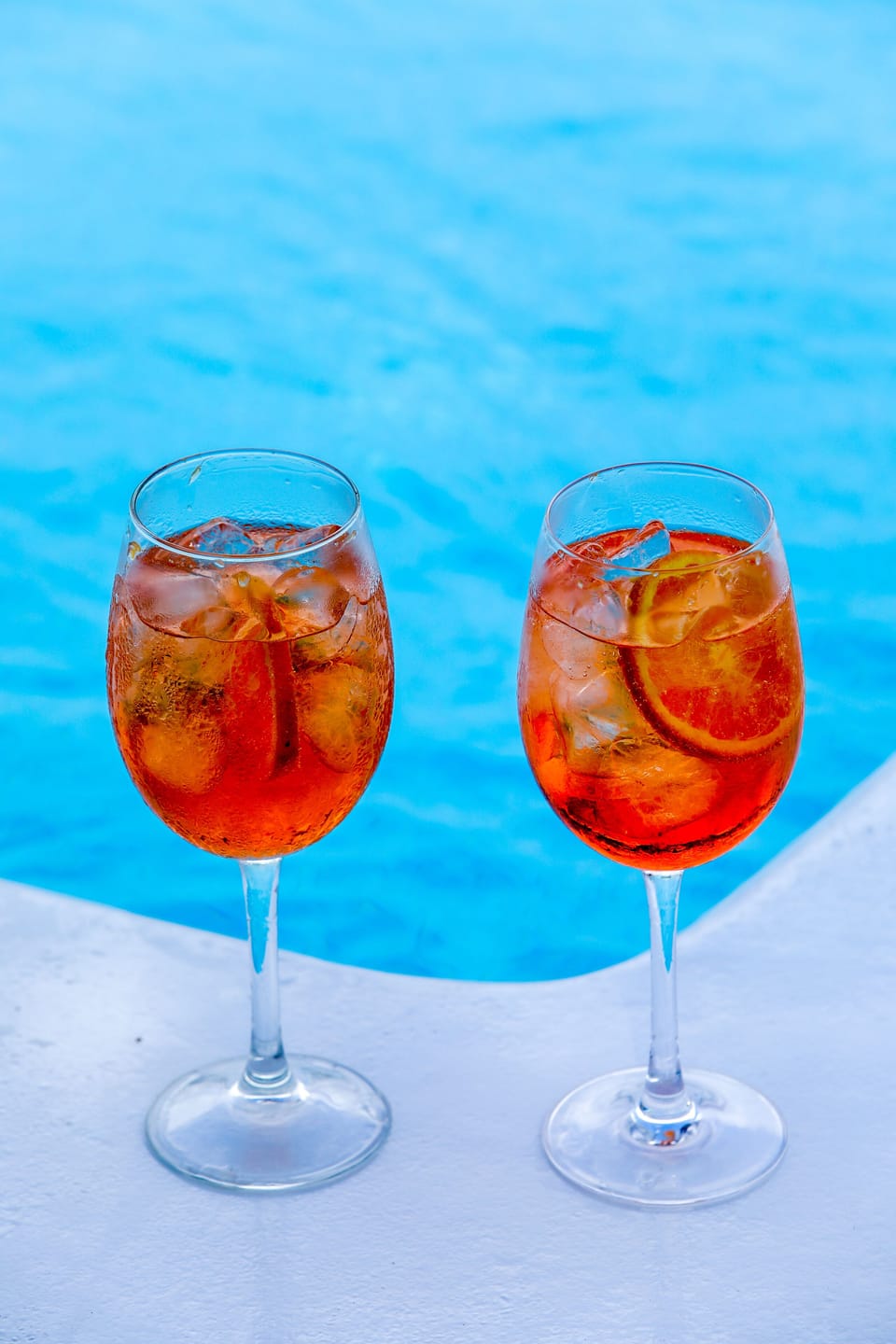 Outdoor pool, open 8:00 AM to 8:30 PM, pool umbrellas