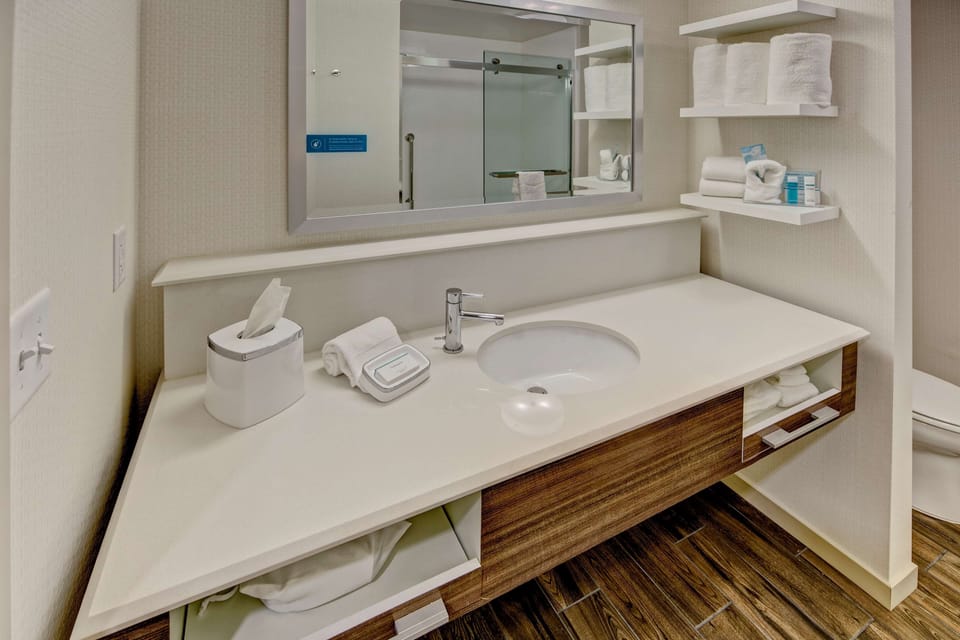 Combined shower/tub, hair dryer, bathrobes, towels