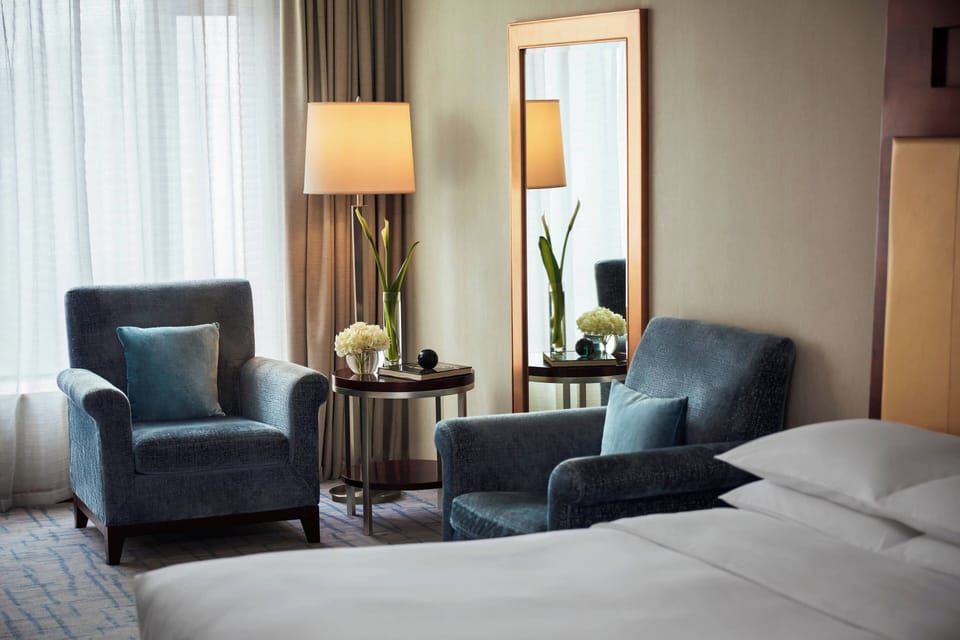 Premium bedding, down comforters, minibar, in-room safe