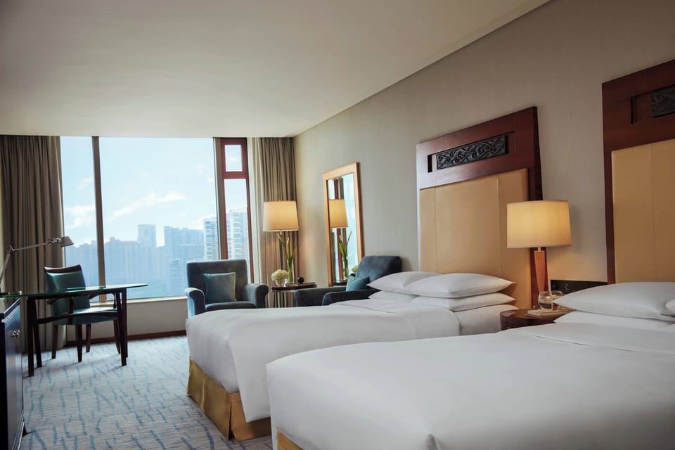 Premium bedding, down comforters, minibar, in-room safe
