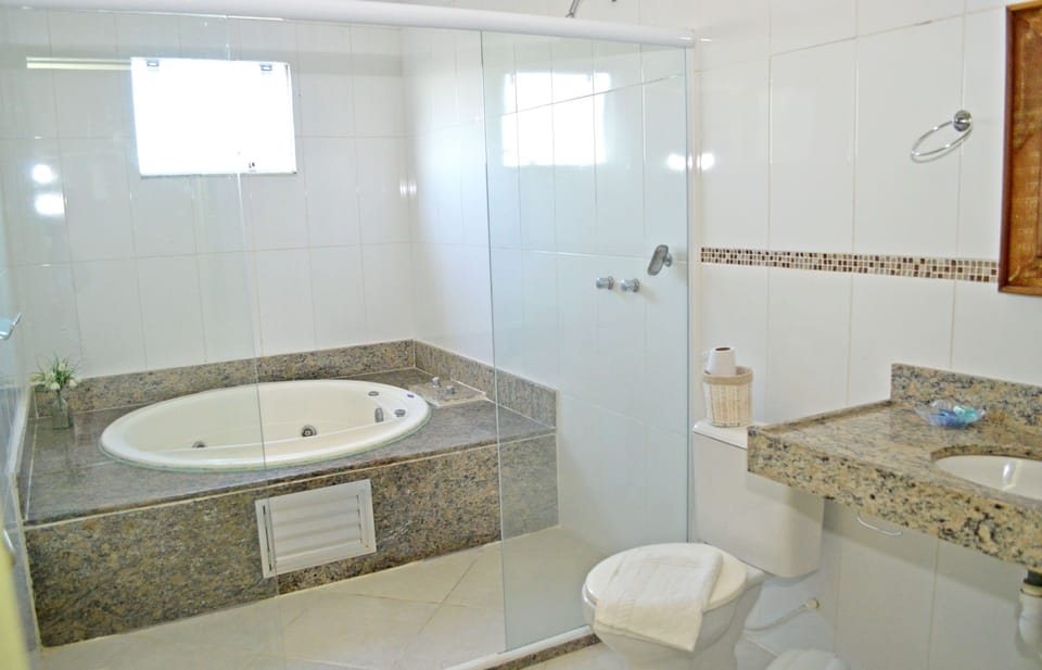 Comfort Room, Multiple Beds | Bathroom | Hair dryer, towels, soap, toilet paper