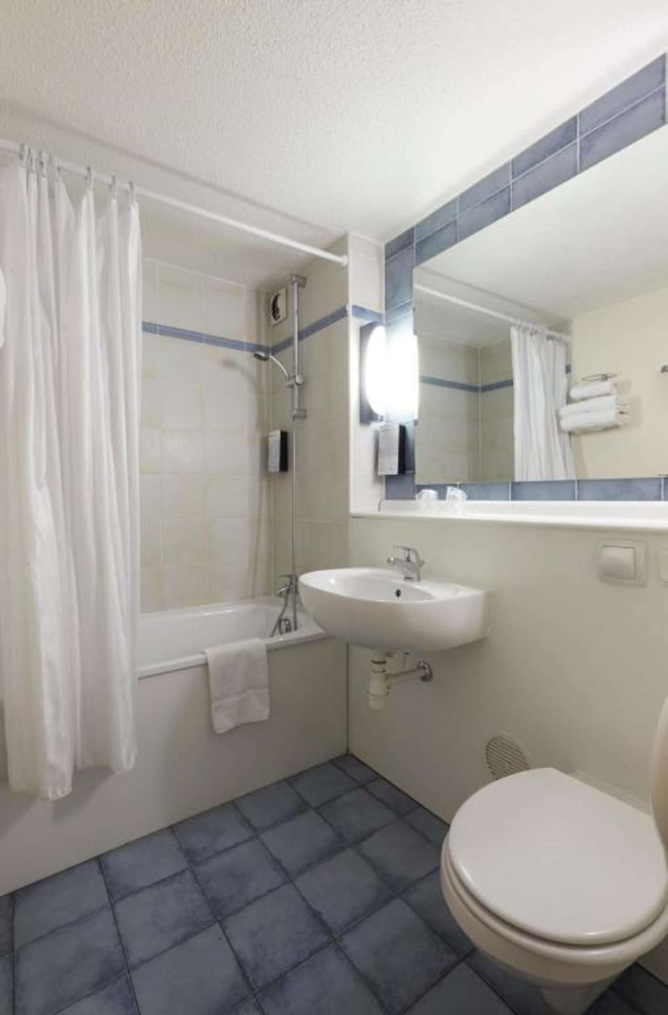 Combined shower/tub, eco-friendly toiletries, hair dryer, towels