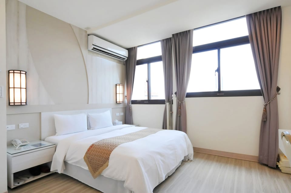 Family Room | Desk, blackout drapes, soundproofing, iron/ironing board