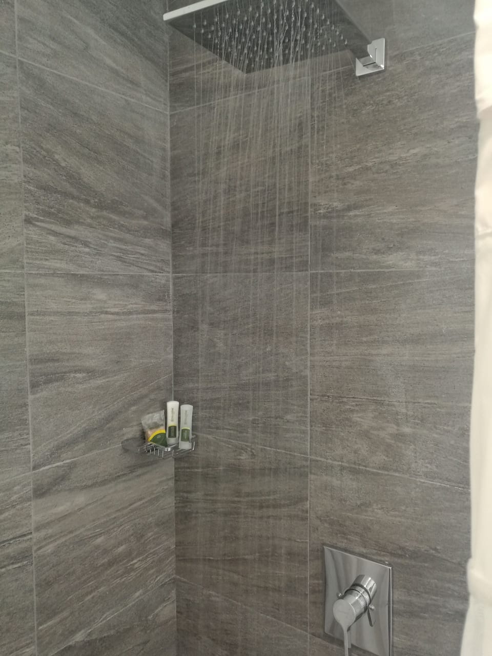 Family Room, 2 Double Beds | Bathroom | Rainfall showerhead, designer toiletries, towels, soap