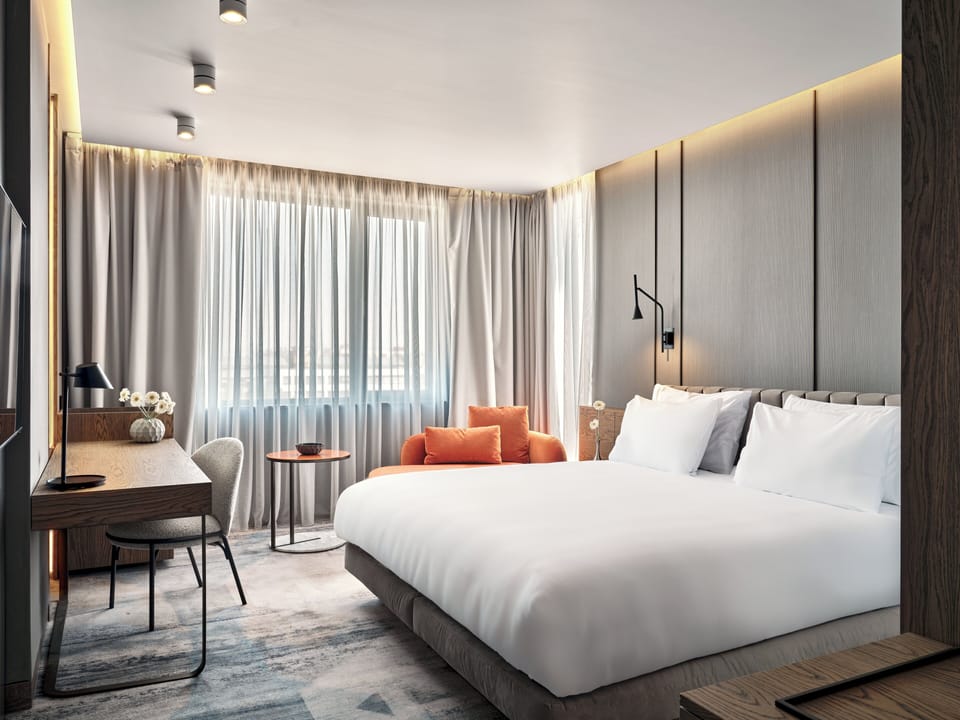 Premium bedding, memory foam beds, minibar, in-room safe