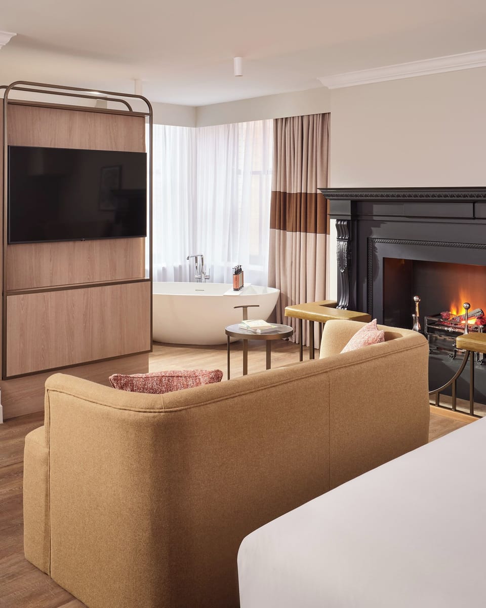 Superior Suite | Living area | 42-inch Smart TV with digital channels, streaming services