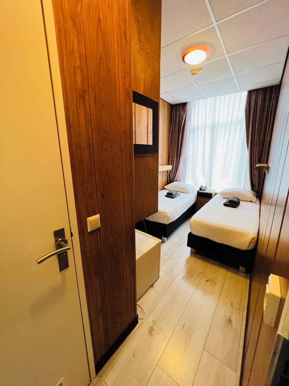Economy Twin Room, 2 Twin Beds | Minibar, in-room safe, iron/ironing board, free WiFi