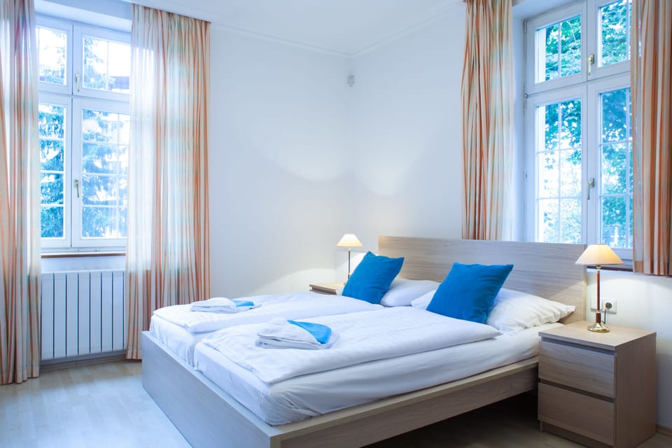 Standard Quadruple Room, 2 Bedrooms, Ensuite, Park View | In-room safe, desk, blackout drapes, soundproofing