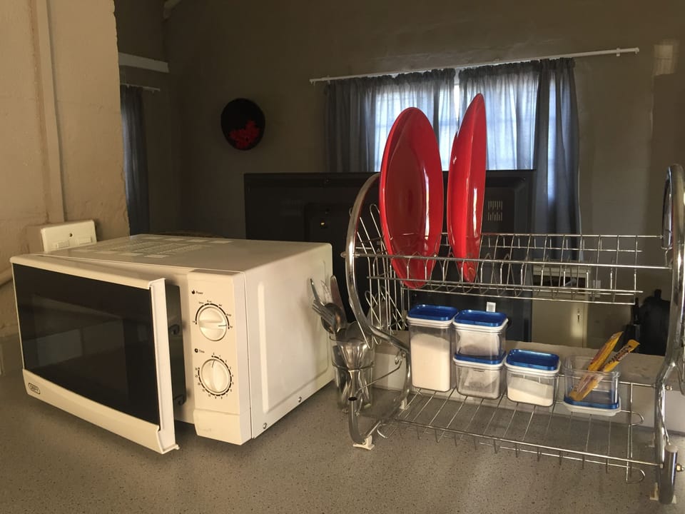 Standard Apartment | Private kitchenette | Coffee/tea maker, fridge, microwave, cookware/dishes/utensils