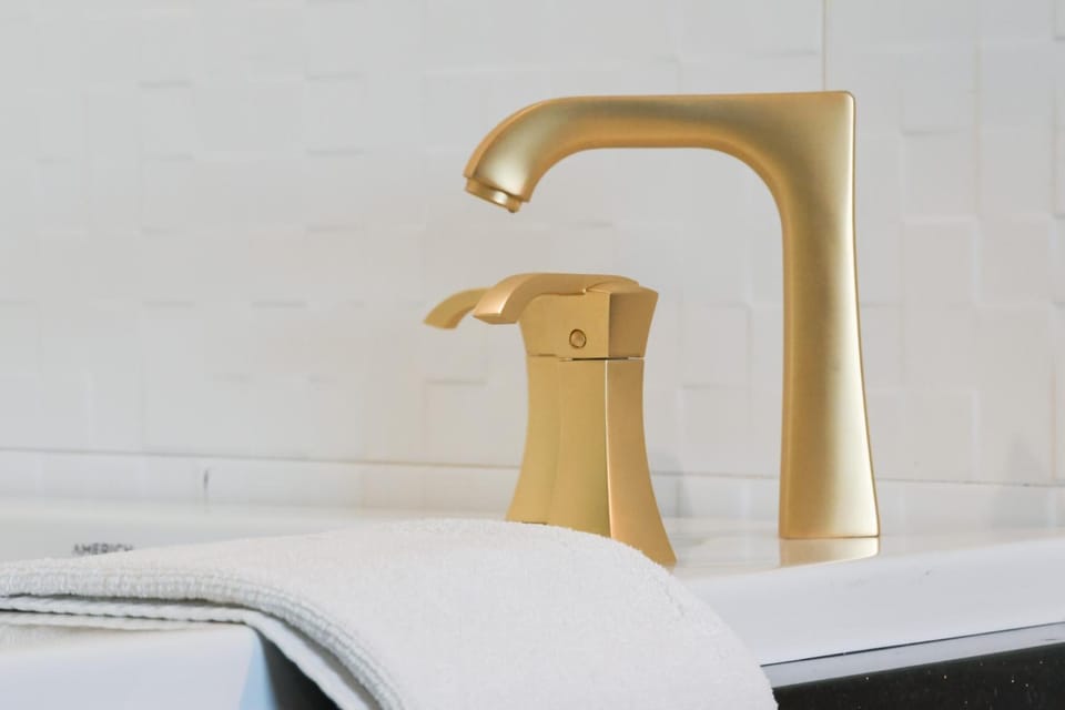 Premium bedding, desk, laptop workspace, iron/ironing board