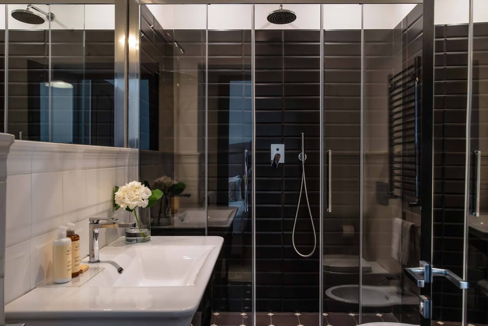 Superior Double or Twin Room | Bathroom | Shower, eco-friendly toiletries, hair dryer, slippers