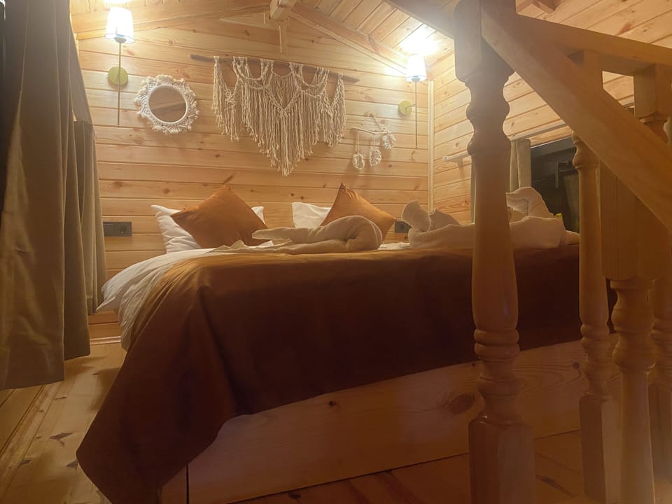 Design Tree House | Desk, laptop workspace, blackout drapes, free WiFi