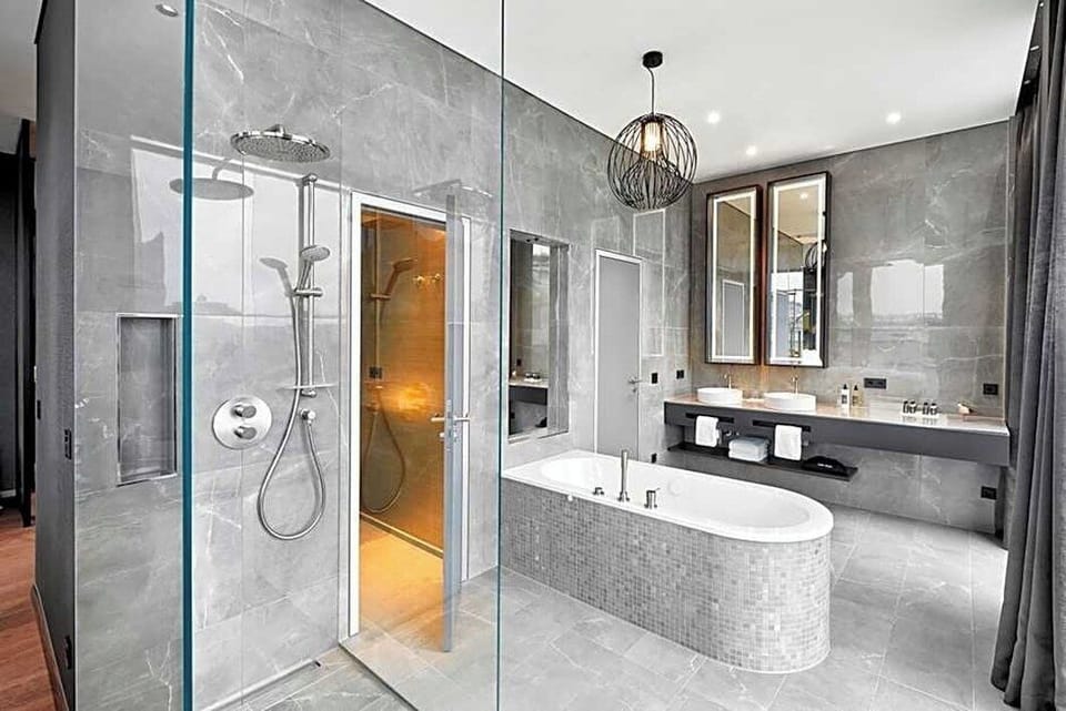 Deep soaking tub, rainfall showerhead, free toiletries, hair dryer