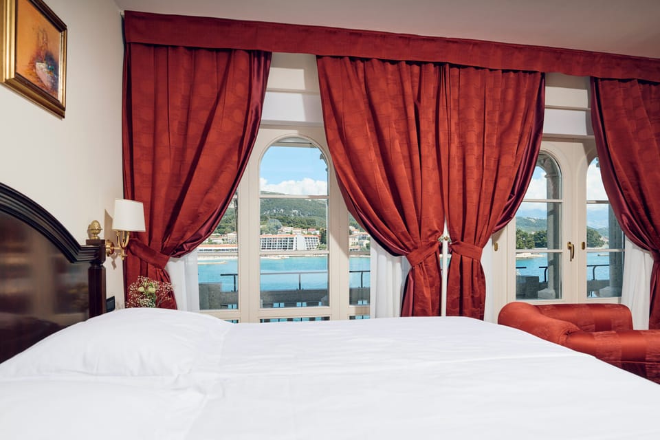 Deluxe Double Room, Balcony, Sea View | Premium bedding, minibar, in-room safe, individually decorated