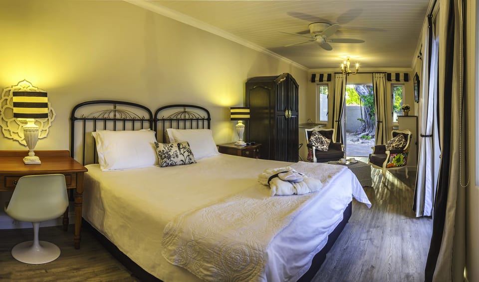 Comfort Room, 1 Bedroom (Calla Lily Suite) | Egyptian cotton sheets, in-room safe, desk, free WiFi