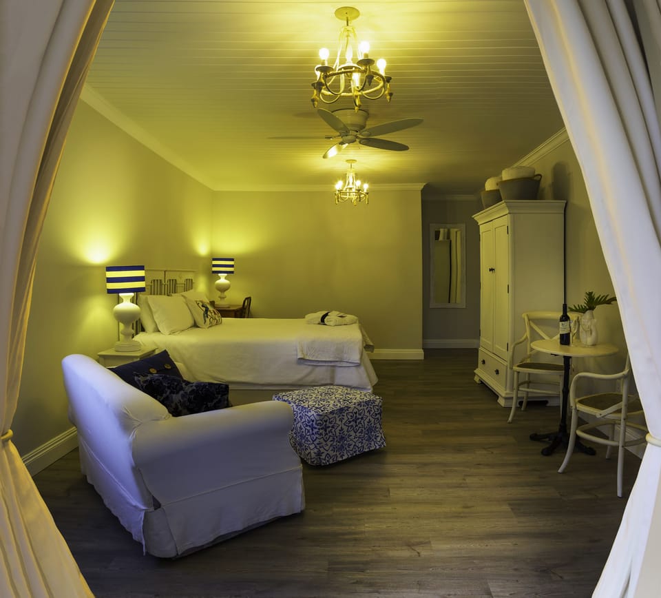 Family Room, 1 Bedroom ( Wisteria Suite) | Egyptian cotton sheets, in-room safe, desk, free WiFi