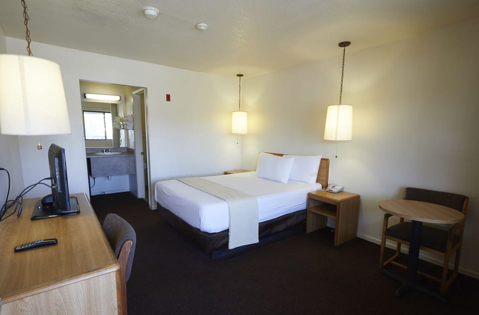 Desk, laptop workspace, blackout drapes, WiFi (surcharge)