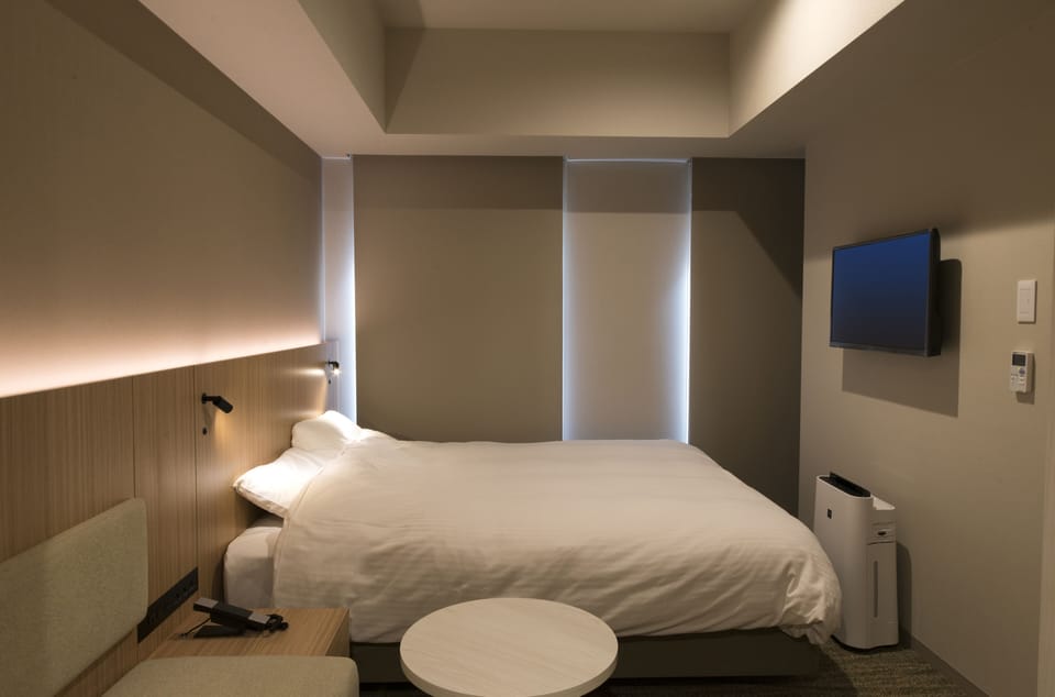 Blackout drapes, iron/ironing board, free WiFi, bed sheets