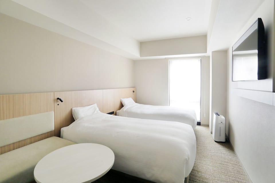 Blackout drapes, iron/ironing board, free WiFi, bed sheets