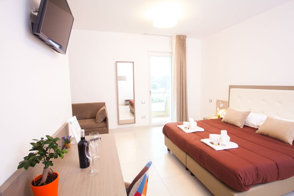 Junior Suite, 1 Bedroom, Balcony | In-room safe, desk, laptop workspace, blackout drapes