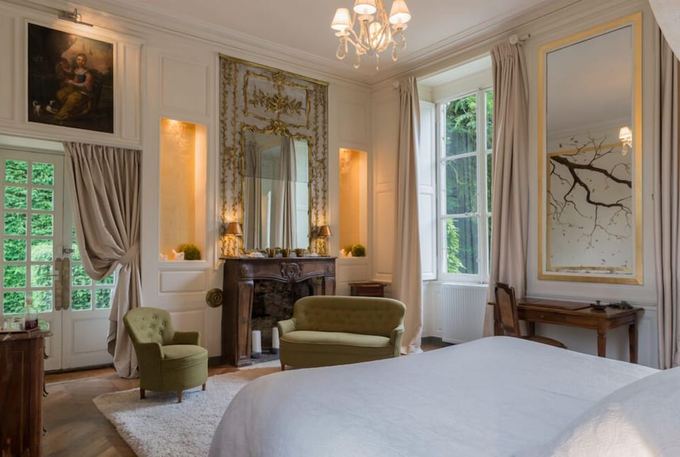 Luxury Suite, Terrace (Roseraie) | Premium bedding, in-room safe, desk, iron/ironing board