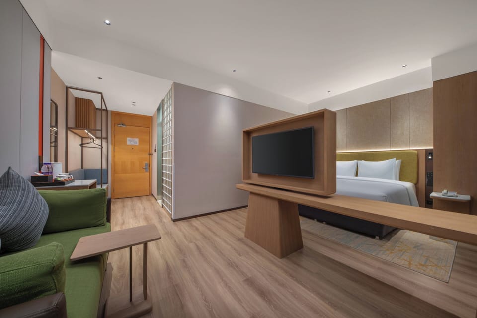 Standard Room, 1 Queen Bed (Exercise Equipment) | In-room safe, desk, blackout drapes, soundproofing
