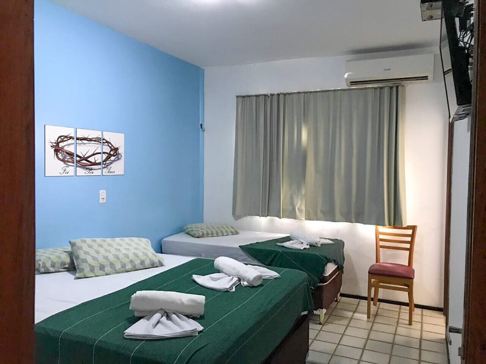 Blackout drapes, WiFi (free), bed sheets