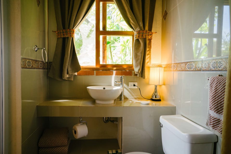 Suite, Multiple Beds, Balcony, Lake View | Bathroom | Shower, free toiletries, hair dryer (on request), towels