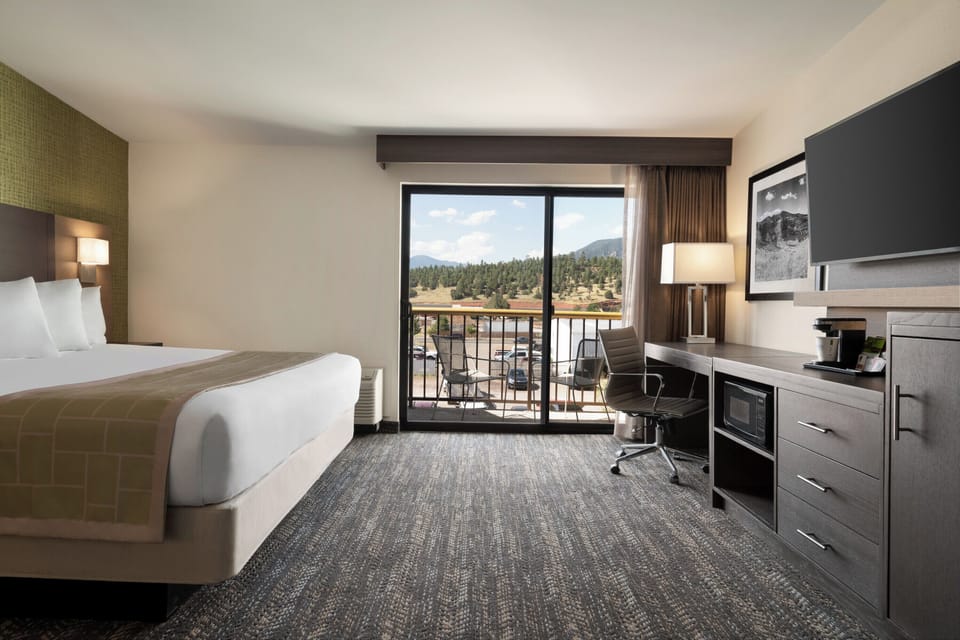 Suite, 1 King Bed with Sofa bed, Non Smoking | Pillowtop beds, in-room safe, iron/ironing board, free cribs/infant beds