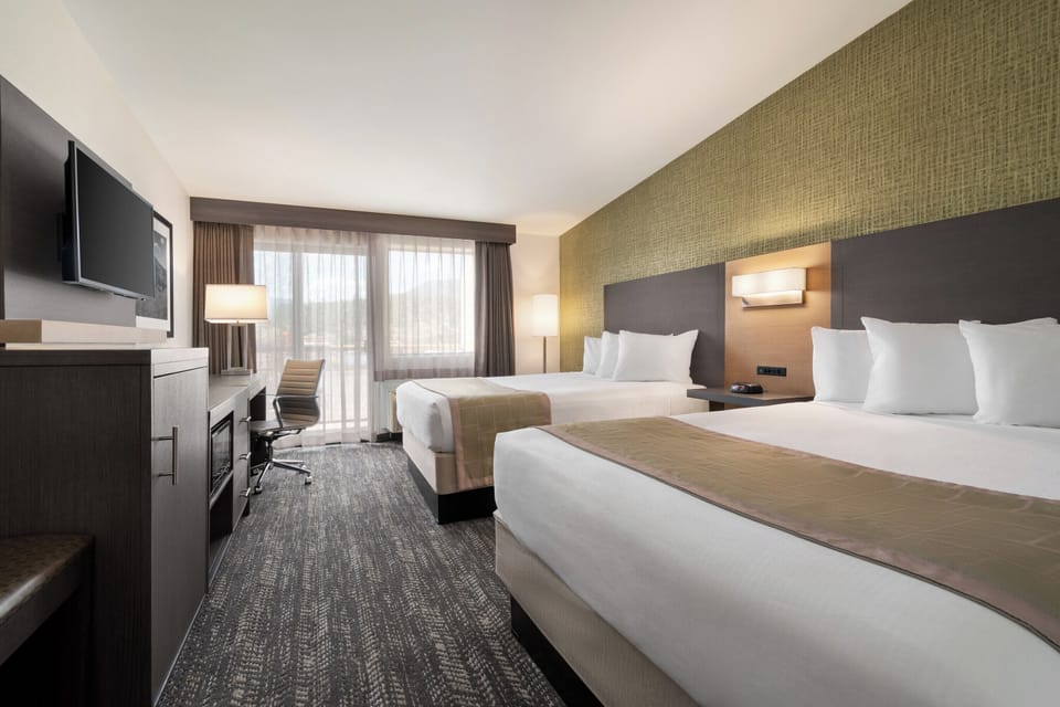 Standard Room, 2 Queen Beds, Non Smoking | Pillowtop beds, in-room safe, iron/ironing board, free cribs/infant beds
