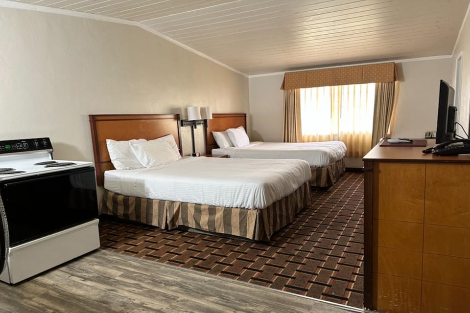 Room, 2 Queen Beds, Kitchenette | Desk, iron/ironing board, free WiFi, bed sheets