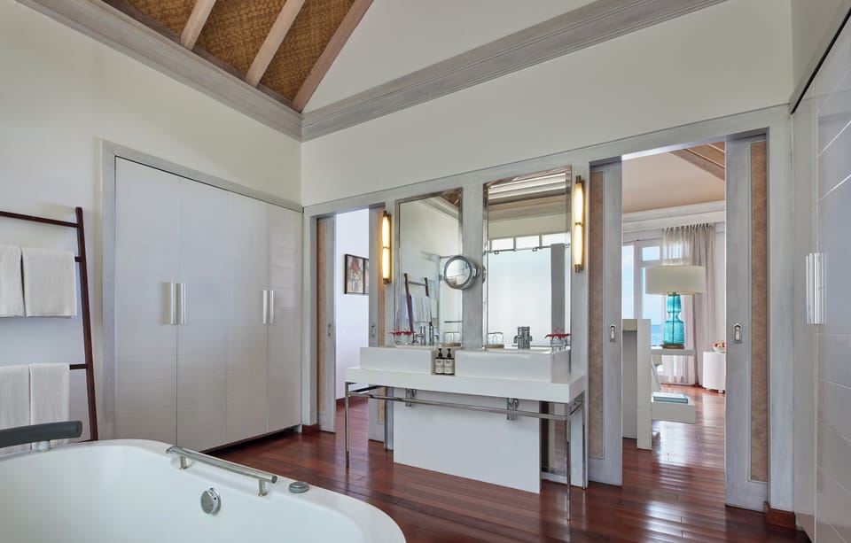 Over Water Villa with Private Pool | Bathroom | Combined shower/tub, jetted tub, rainfall showerhead
