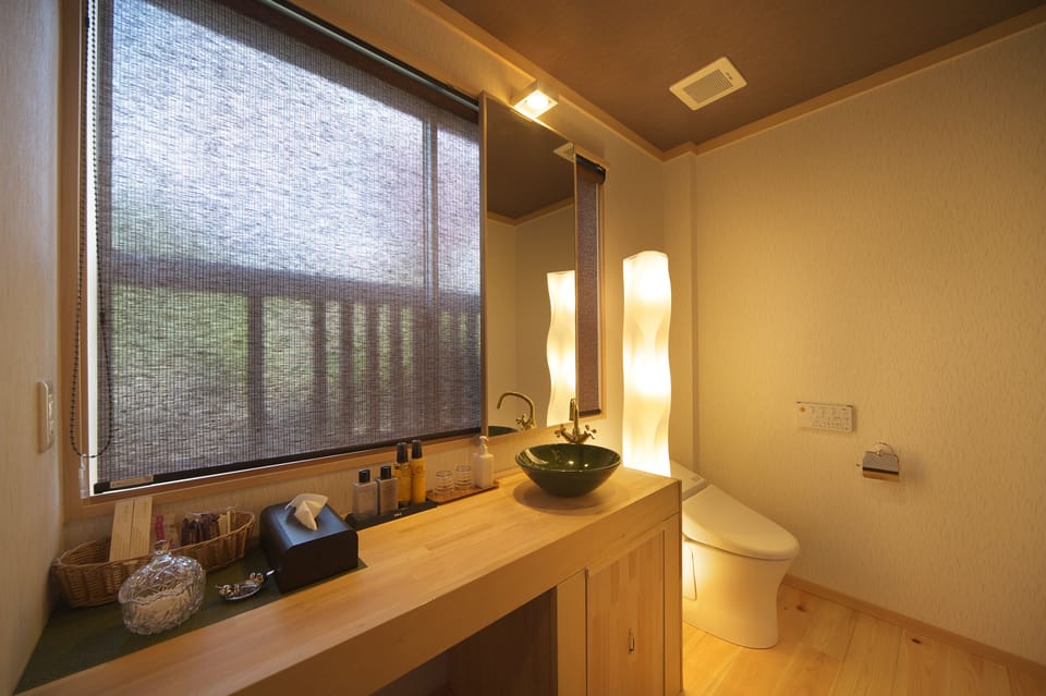 Deluxe Japanese Style Room with Tatami area, Open-air Bath | Bathroom | Deep soaking tub, free toiletries, hair dryer, slippers