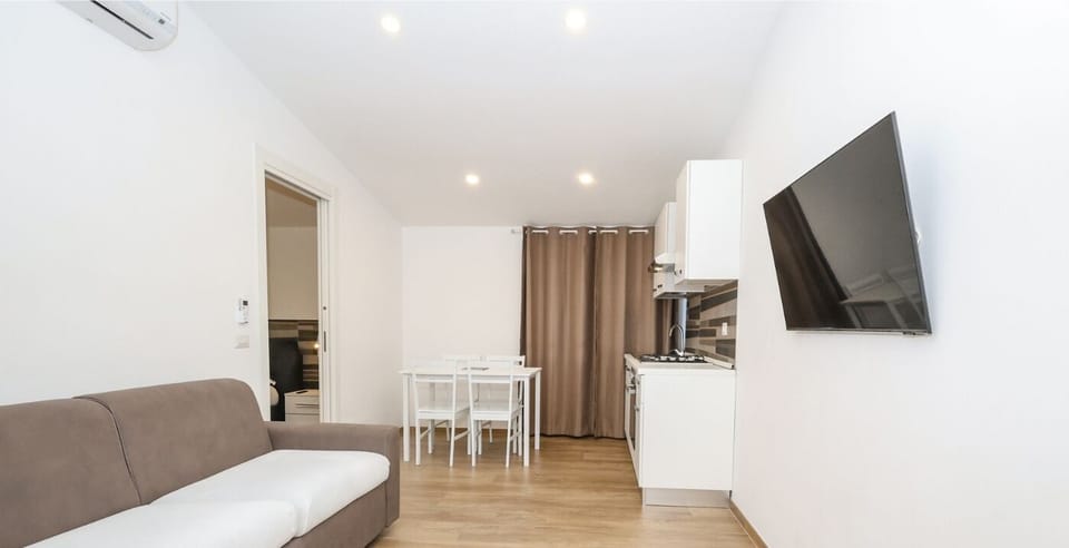 Family Condo | Living area | 32-inch Smart TV with digital channels, Netflix, streaming services