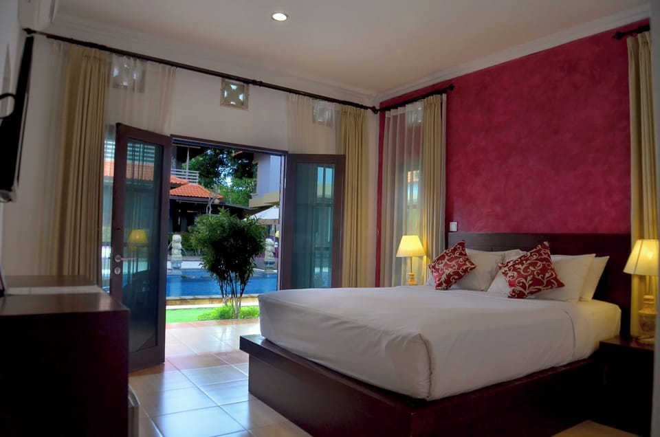 Deluxe Double Room, Pool View | In-room safe, desk, blackout drapes, free cribs/infant beds
