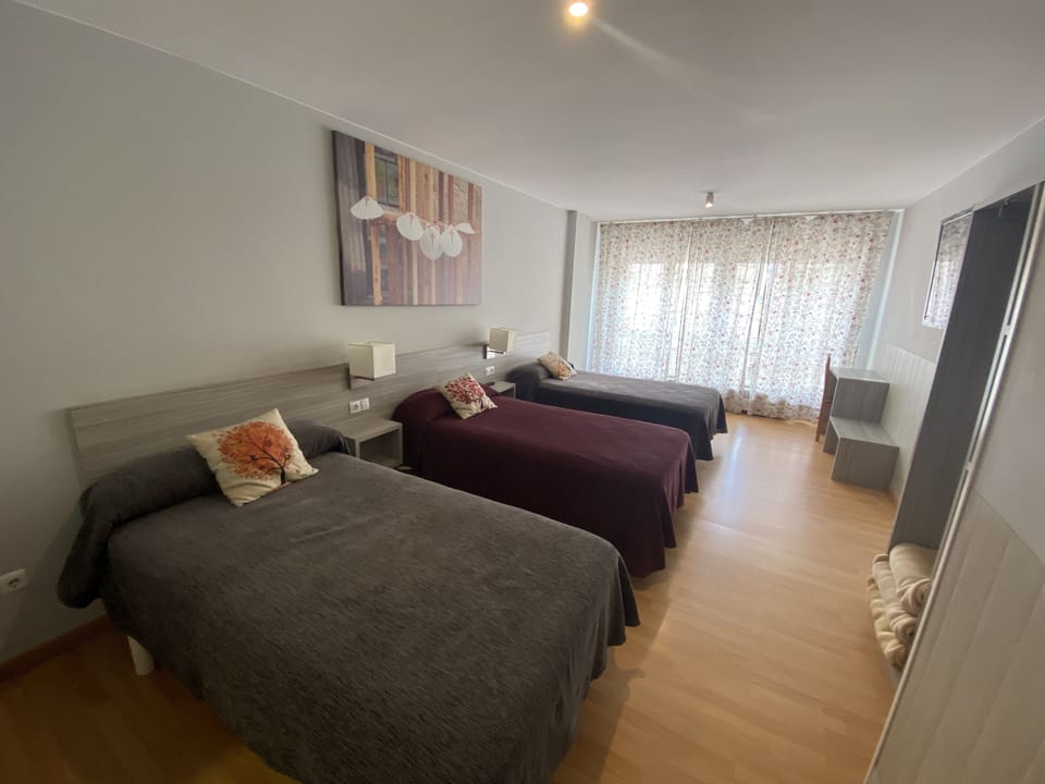 Triple Room, Private Bathroom | Premium bedding, individually furnished, desk, laptop workspace