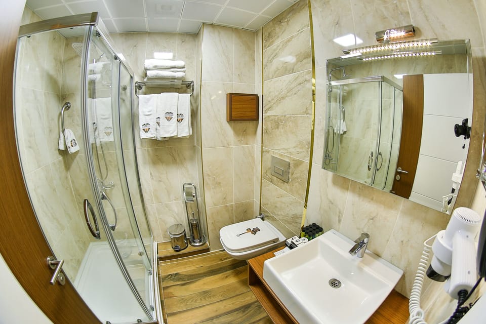 Family Room, 1 Bedroom | Bathroom | Shower, free toiletries, hair dryer, slippers