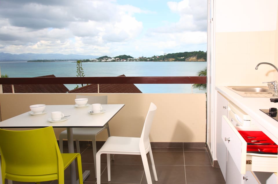 Room, Sea View | Minibar, in-room safe, individually decorated, desk