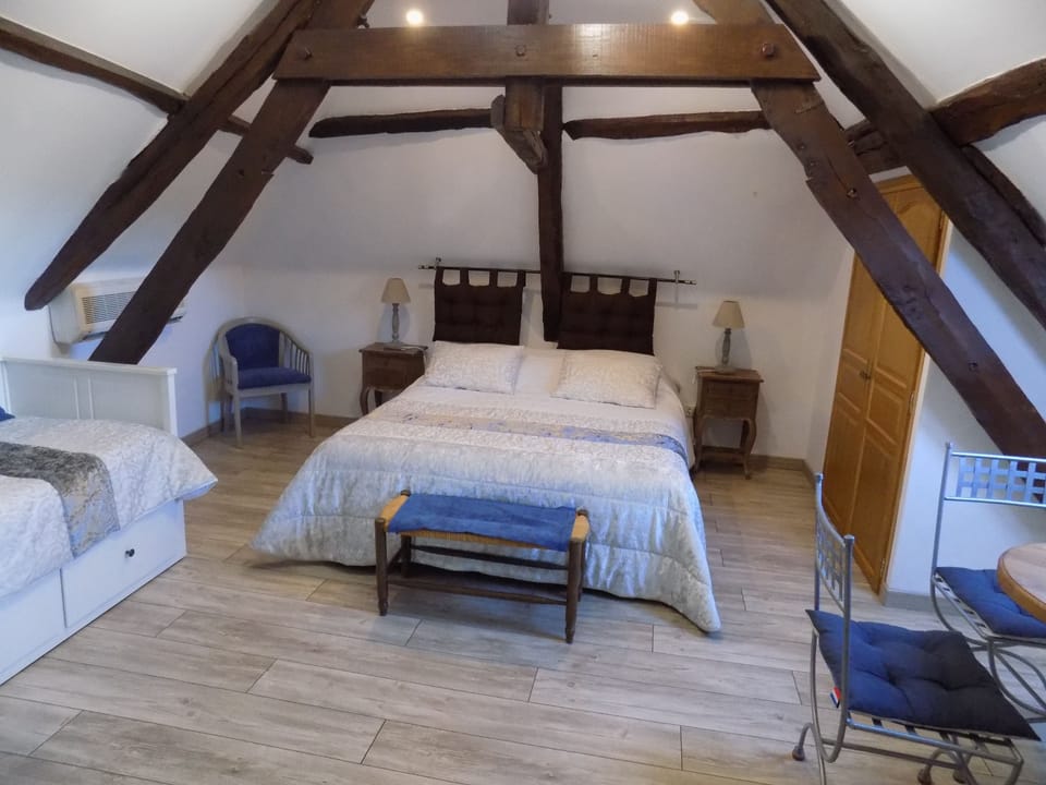 Family Room | Premium bedding, individually decorated, individually furnished, desk