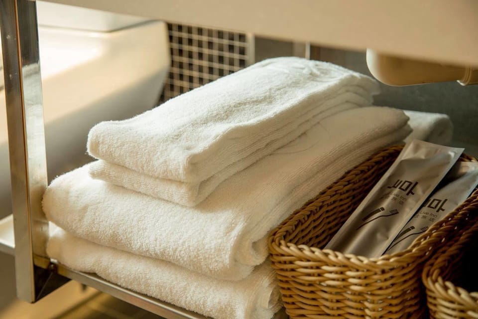 Shower, free toiletries, hair dryer, slippers