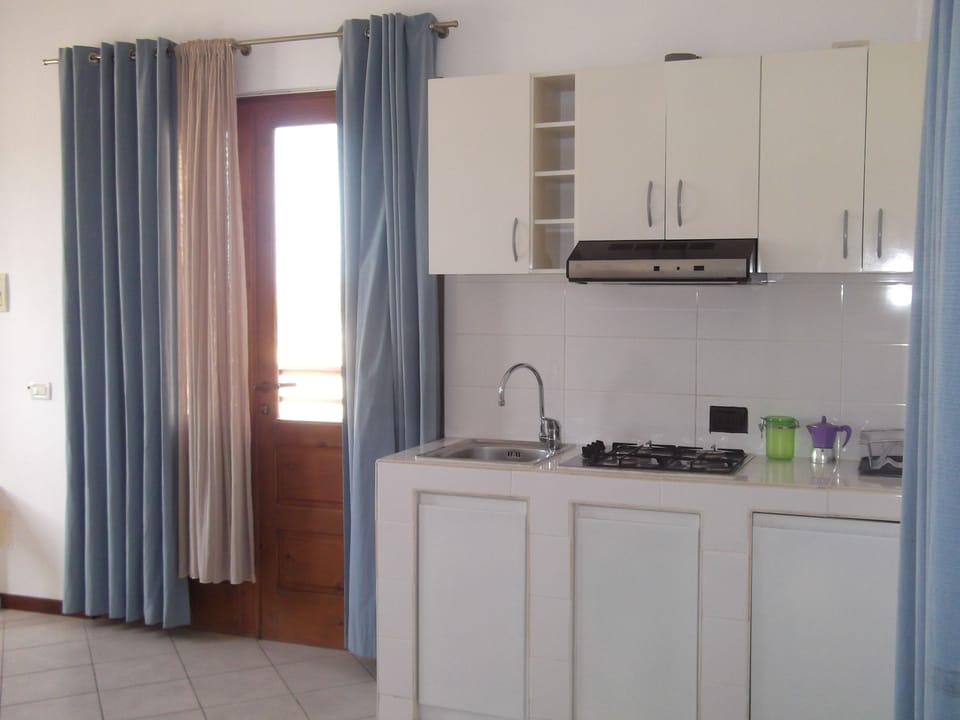 Apartment, 1 Bedroom, Oceanfront | Private kitchenette | Coffee/tea maker, full-size fridge, oven, stovetop