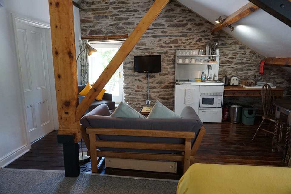 Penthouse Self-catering Apartment | Living area | Smart TV