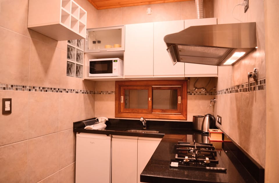 Deluxe Triple Room, 1 Bedroom, Patio, Garden View | Private kitchen | Fridge, microwave, electric kettle, paper towels