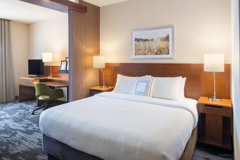 Premium bedding, desk, blackout drapes, iron/ironing board
