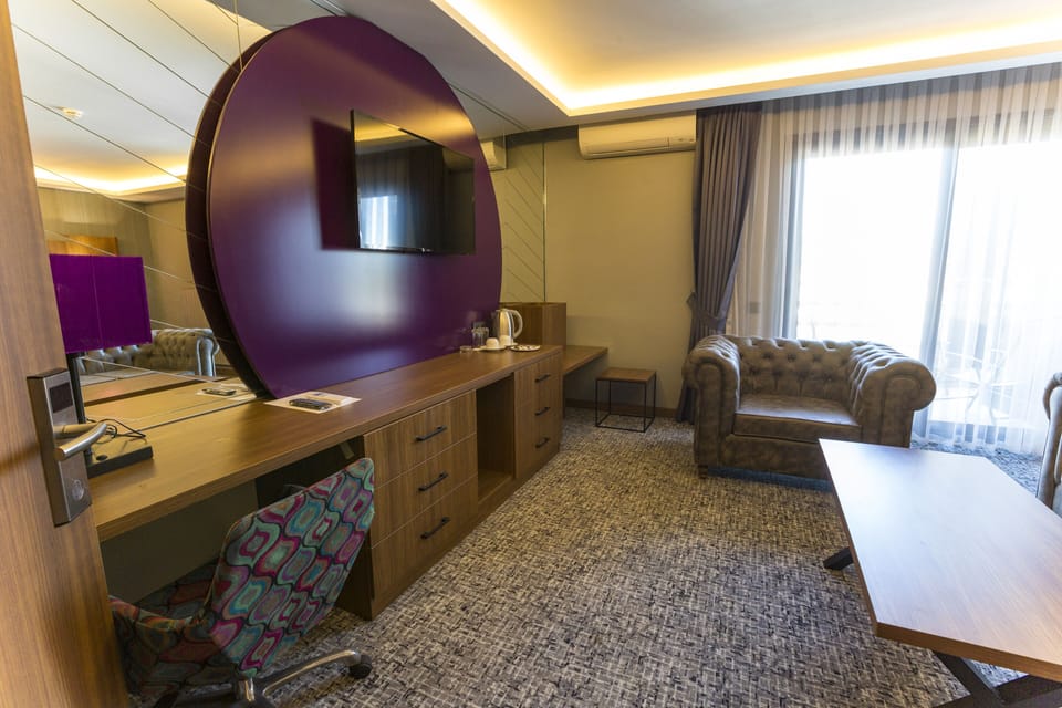 Suite, City View | Minibar, desk, soundproofing, iron/ironing board