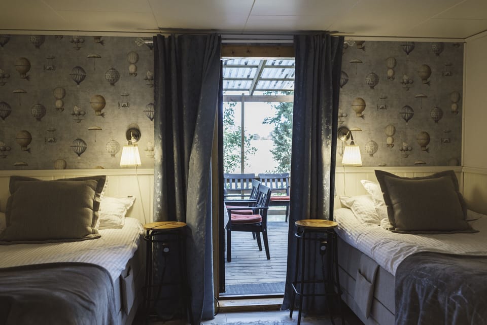 Small Twin Studio | Pillowtop beds, individually decorated, individually furnished