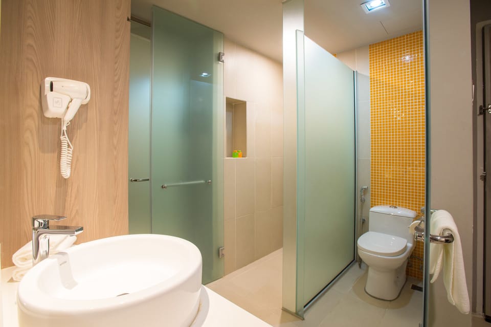 Shower, eco-friendly toiletries, hair dryer, bidet