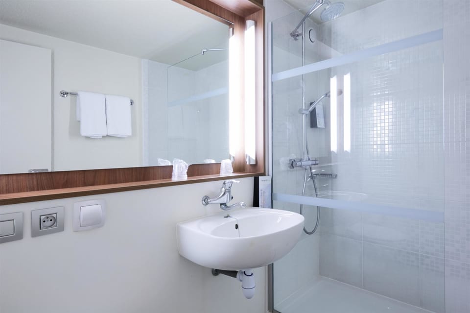 Eco-friendly toiletries, hair dryer, towels, soap